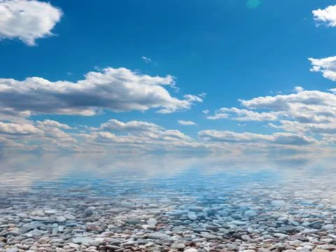 Pebble beach and sky 스톡 사진