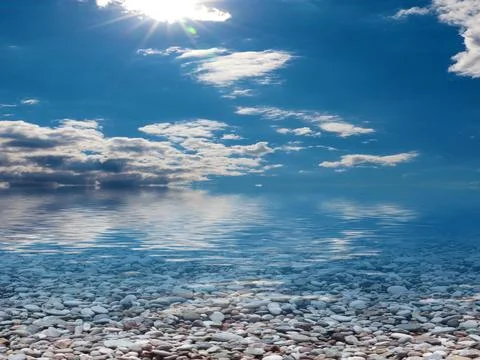 Pebble beach and sky 写真素材