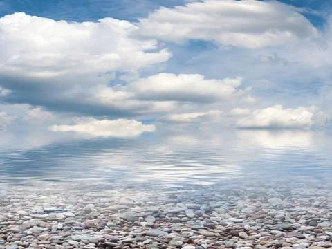 Pebble beach and sky 스톡 사진
