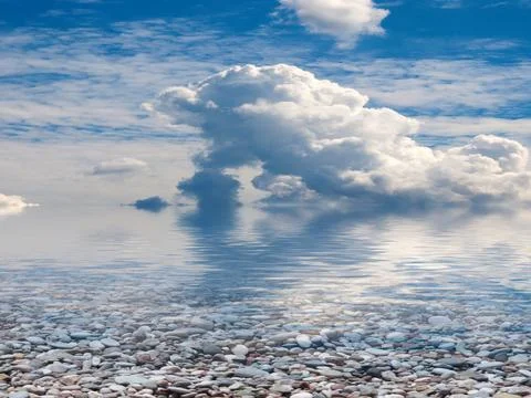Pebble beach and sky 스톡 사진