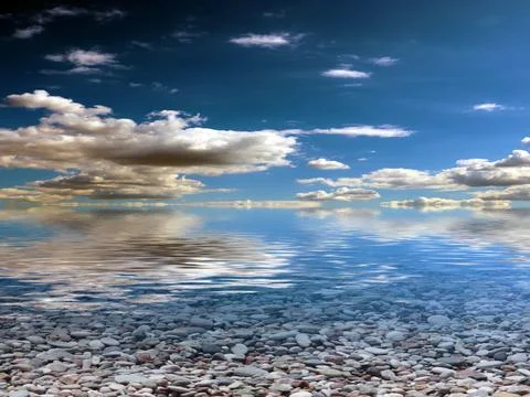 Pebble beach and sky 스톡 사진
