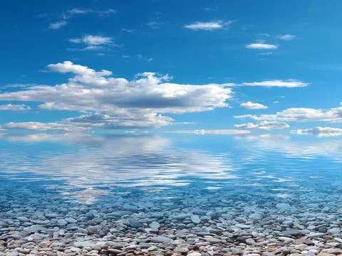 Pebble beach and sky 스톡 사진
