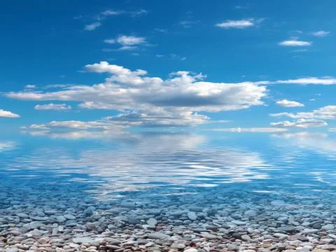 Pebble beach and sky Stockfoto's
