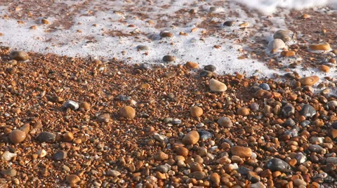 Pebble beach and small waves Stock Footage 941199