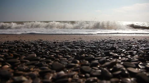 Pebble beach and waves Stock Footage 37162456