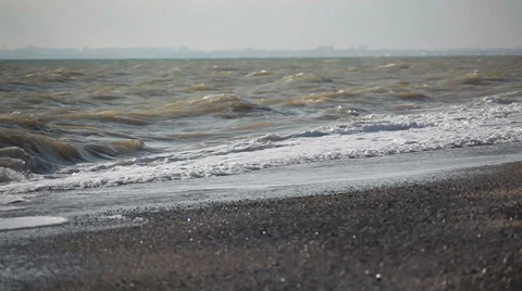 Pebble beach and waves Stock Footage 37164140