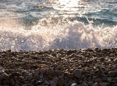 Pebble beach and waves 스톡 사진