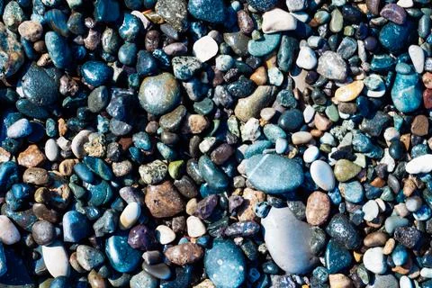 Pebble beach bright horizontal background Stock Photos