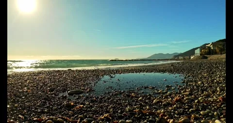 Pebble beach on the Ligurian coast Stock Footage 313809354
