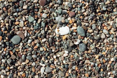 Pebble beach multi colored horizontal background Stock Photos