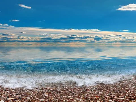 A pebble beach for relaxation Stock Photos