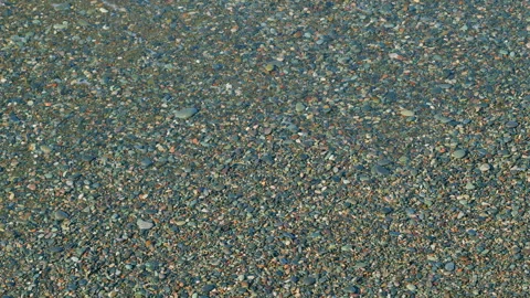 Pebble Beach With Rough Sea. Coast With Large Pebble. Sea Pebble Beach With Stock Footage 258160682
