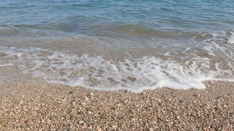 Pebble beach sea roll, waves on coast 스톡 동영상 165200686