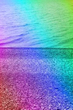Pebble beach on seaside Stock Photos