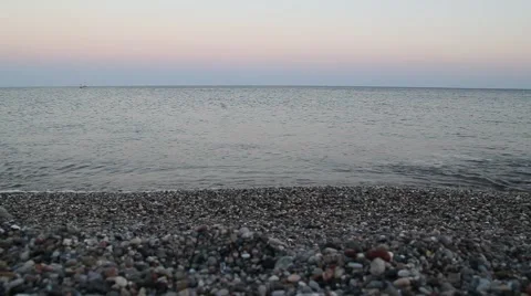 Pebble beach surf at sunset Stock Footage 48036879