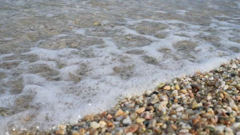 Pebble beach waves Stock Footage 295239135