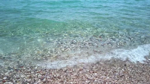 Pebble coast and waves in Antalia, Turkey. Konyaalti beach Stock Footage 155659993