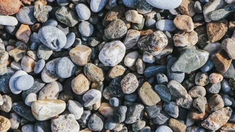 Pebble cobblestones on the beach loop. Nautical marine background. Stock Footage 224033477
