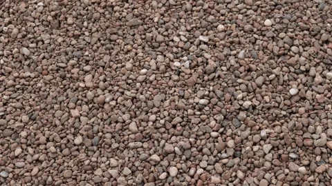 Pebble covered ground texture Stock Footage 344875077