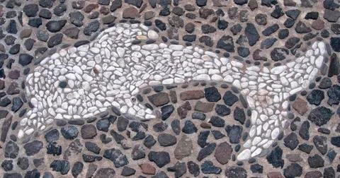Pebble Mosaic Dolphin Stock Photos