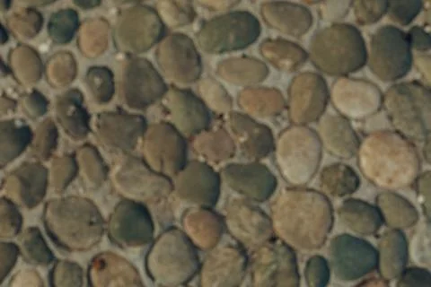 Pebble or shingle seamless texture or background Stock Photos