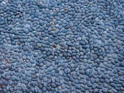 Pebble pattern on ground Stock Photos