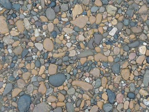 Pebble pattern in the structure of a rocky surface Stock Photos