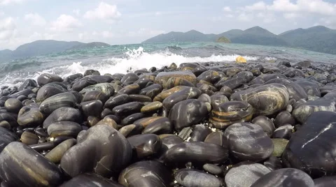 Pebble rocks on beach Stock Footage 54605316