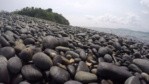 Pebble rocks on beach Stock Footage 79187385