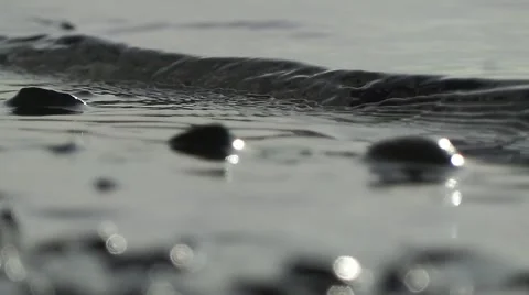 Pebble in the sea Vídeos de archivo 50877979