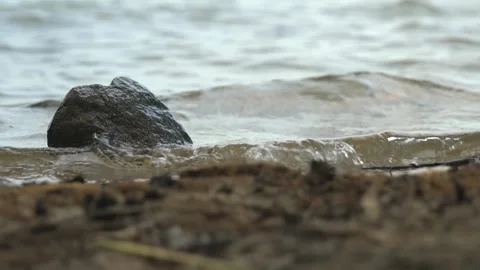 Pebble shore 4k Stock Footage 266673640