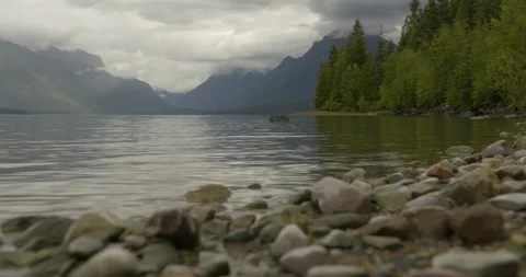 Pebble on the shore of lake Stock Footage 97608079