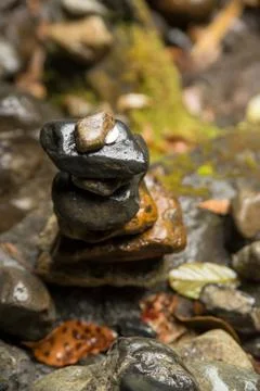 Pebble stack in the forest Stock Photos