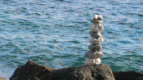 Pebble stack on a rock Stock Footage 143992251