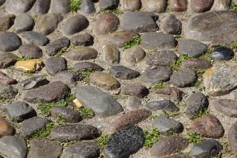 Pebble stone floor tile In perspective with focus selection Stock Photos