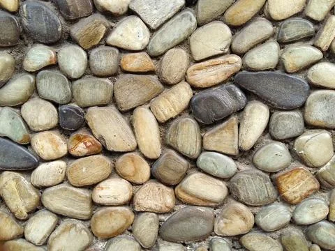 The pebble stone floors, background textures Stock Photos
