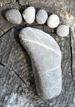 Pebble stone foot Stock Photos