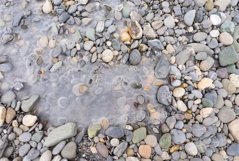 Pebble stone ice background texture Stock Photos