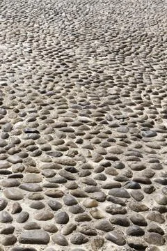 Pebble stone pavement Stock Photos