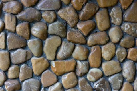 The pebble stone texture , use as background ,pebble stone floor Stock Photos