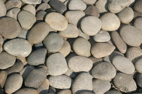Pebble stones background Stock Photos