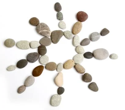 Pebble sun isolated Stock Photos