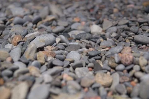 Pebble texture background a shallow depth of field Stock Photos