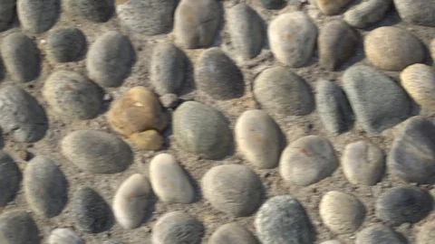 Pebble texture in fast motion for warm-up of eyes, hard look Stock Footage 89579803