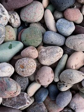 Pebble texture on the lake beach Stock Photos