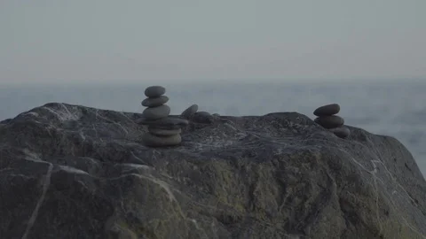 Pebble Towers on a Rock Video stock 79657657