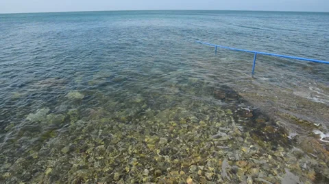 Pebble under clean water Stock Footage 34366216