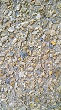 Pebble wall texture closeup Stock Photos