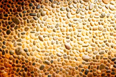 Pebble wall texture Stock Photos