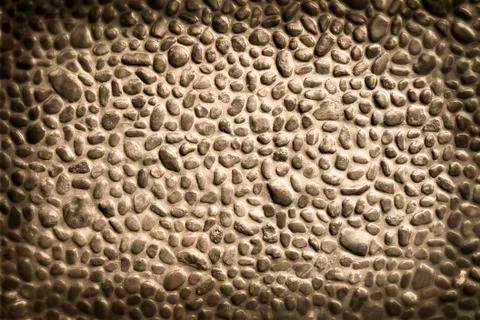 Pebble wall texture Stock Photos